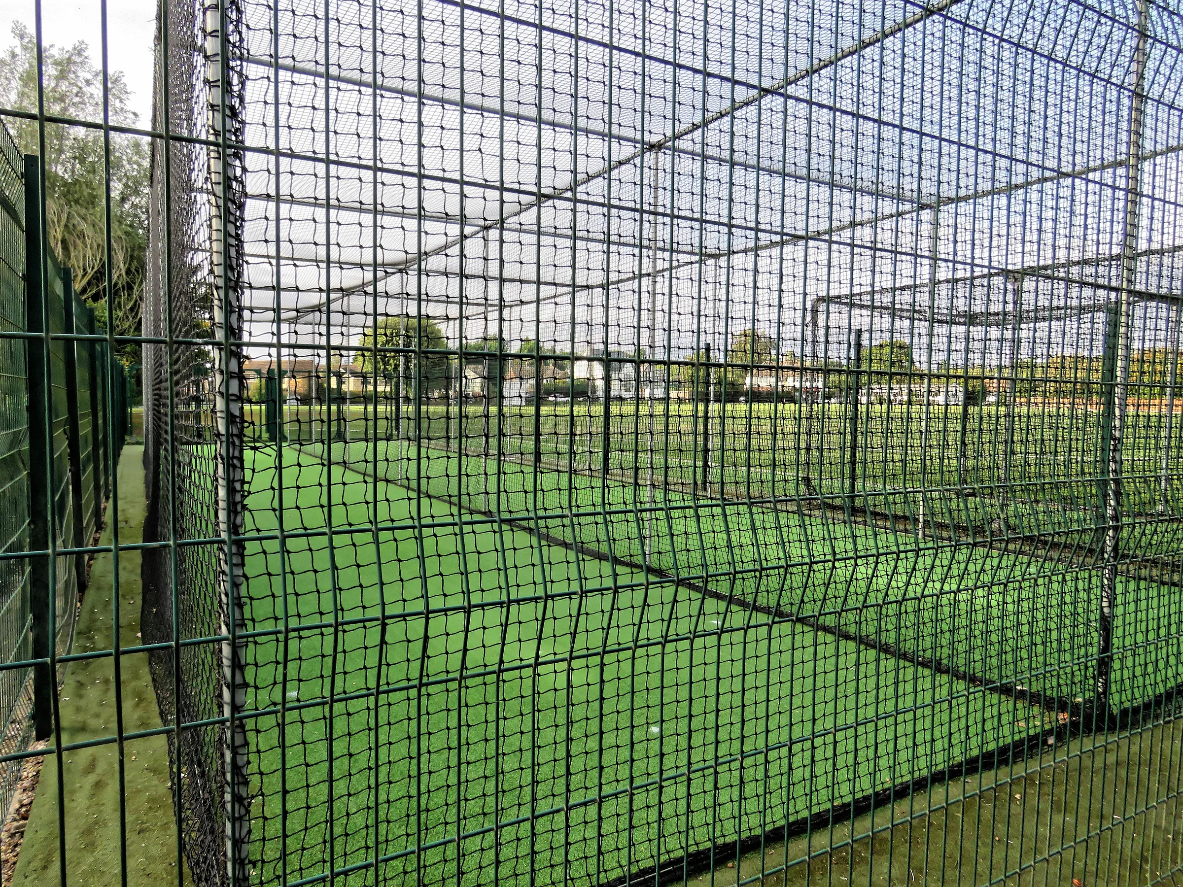 Cricket practice nets lanes on artificial turf